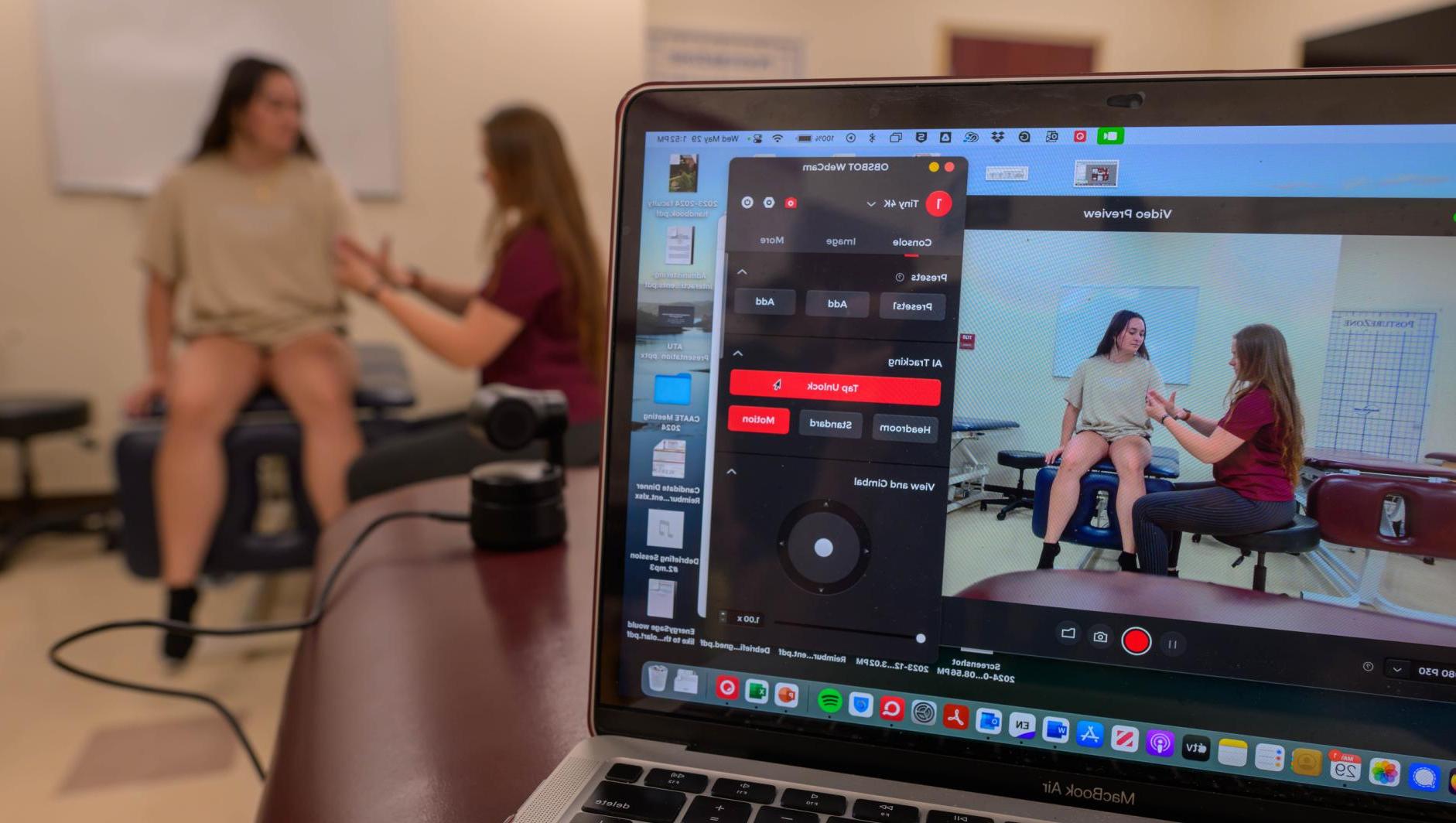 Springfield College Athletic Training students and faculty use an AI-based camera system in the teaching lab on May 29, 2024.