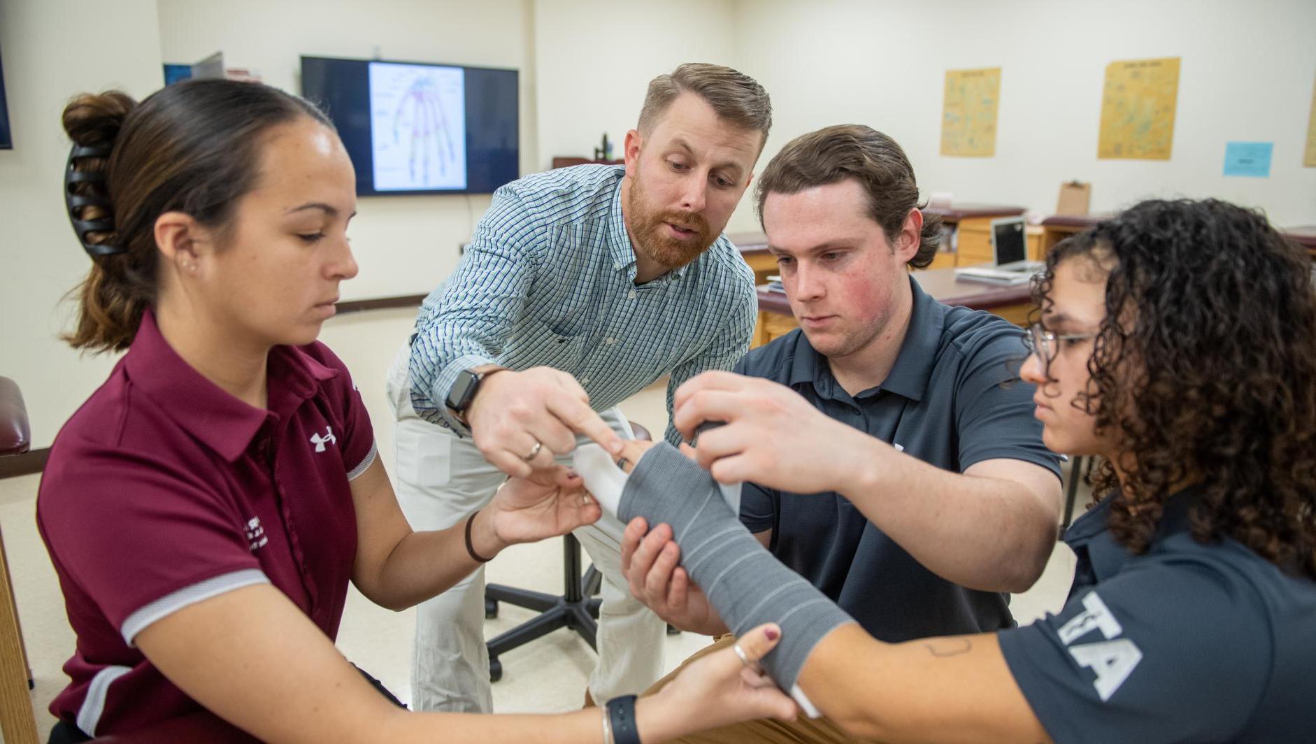 Athletic training faculty and students in the athletic training facilities at Springfield College on December 6, 2022.